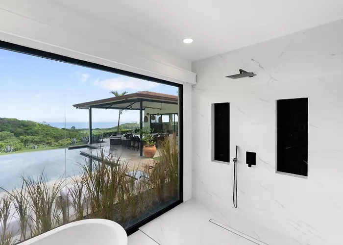 Luxe Tropical With Sparkling Infinity Pool, Panoramic Ocean Views & Community Amenities * Playa Flamingo