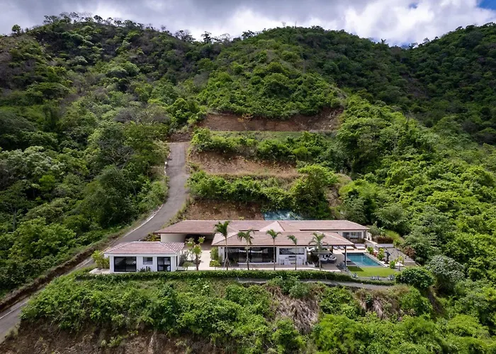 Luxe Tropical With Sparkling Infinity Pool, Panoramic Ocean Views & Community Amenities