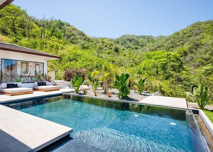 Luxe Tropical With Sparkling Infinity Pool, Panoramic Ocean Views & Community Amenities